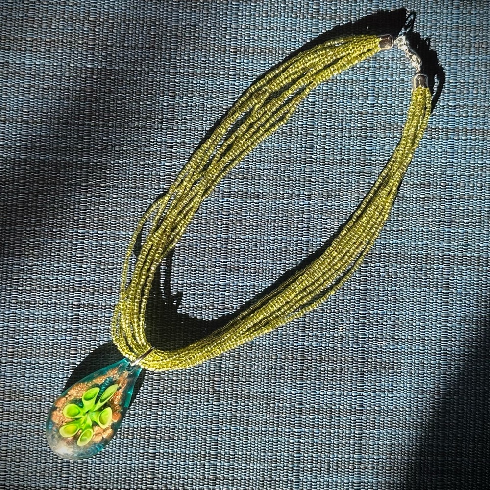 Green Beaded Necklace with Floral Pendant